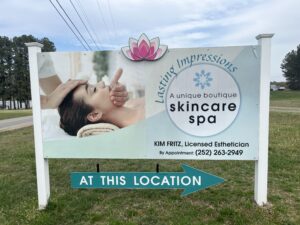 lasting impressions skincare spa logo in teal